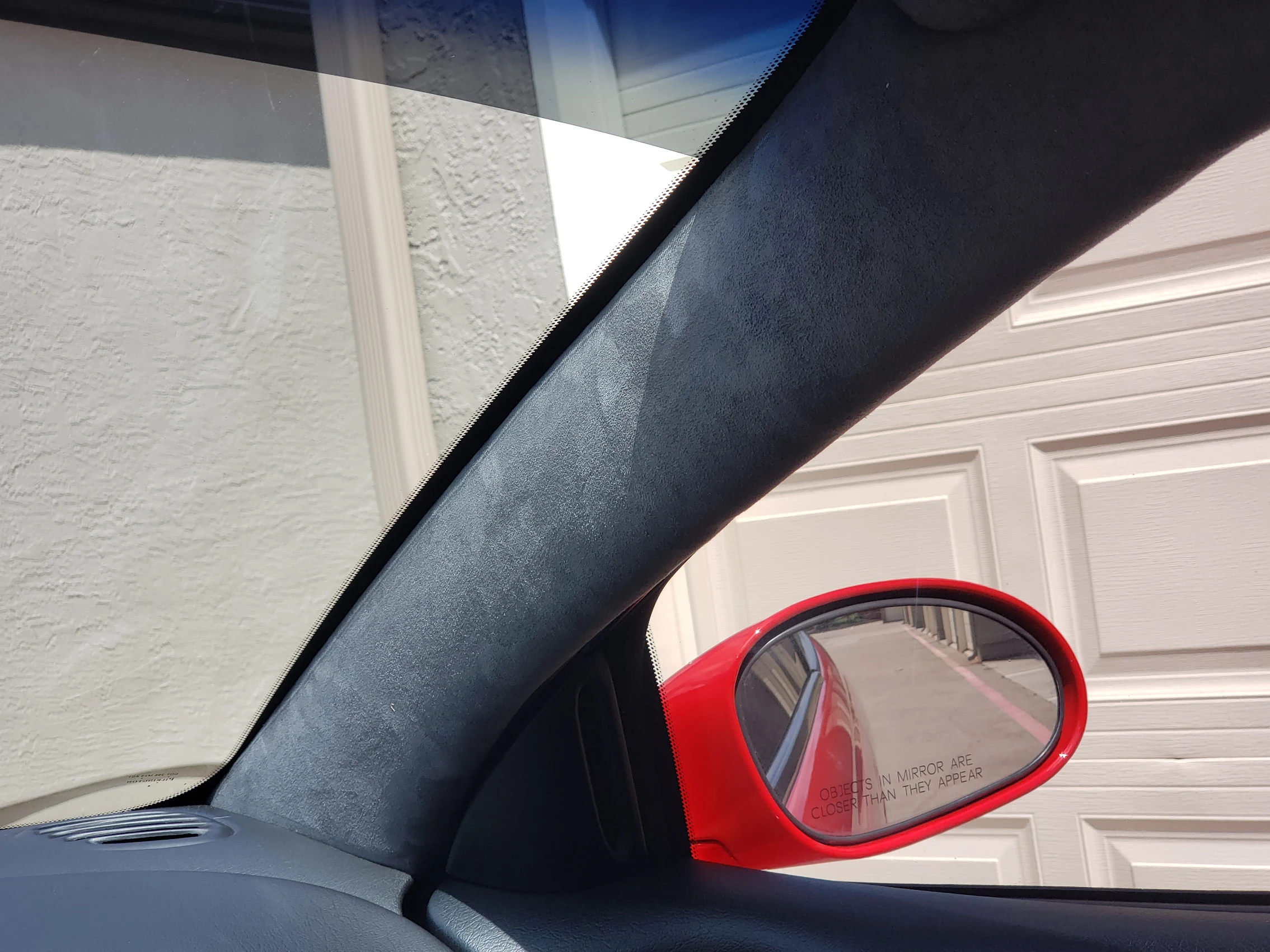 Replaced A-pillar suede