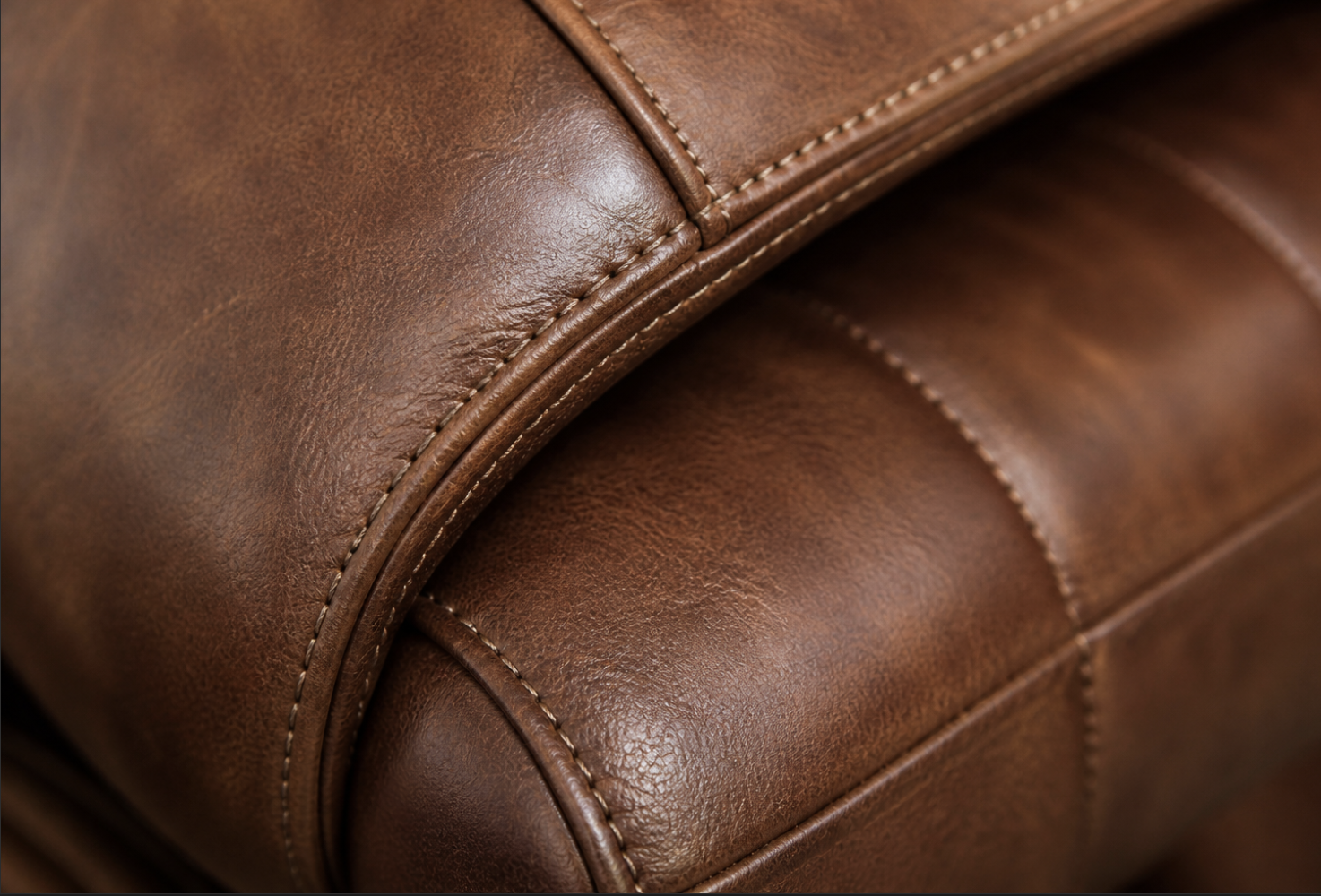 Saddle-brown leather with hand-stitched panels